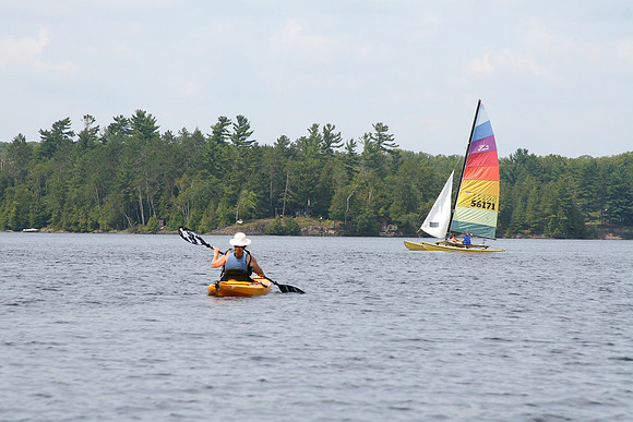 Judy in kayak heading straight to our cottage.