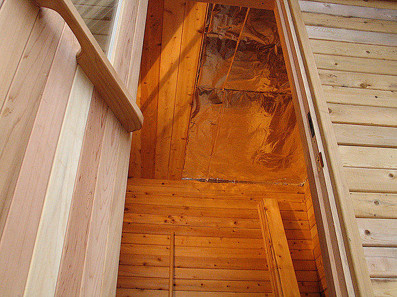 Inside ceiling - insulated, and reflective film.  Covered with T&G cedar.
