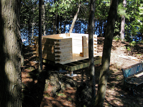 Lots of layers, drilled and spiked with 10 inch nails.