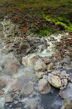 White mineral sediments coated the rocks.