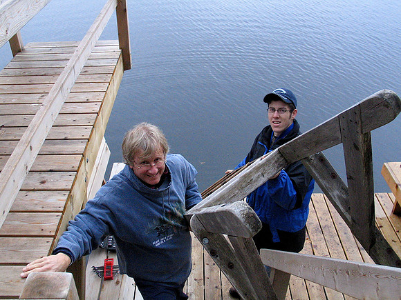 David and Jonathan taking the dock out in the fall.
