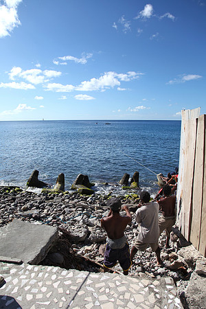 A small town hauling in fish nets
